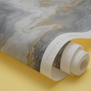 White marble pattern with curly grey and golden veins.